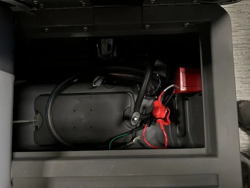 Slide: The Image of Battery compartment of 2025 Bennington 188 SF Family boat, showing wiring and connections. - 26