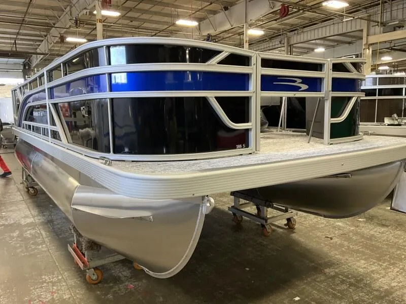 Slide: The Image of 2025 Bennington 188 SF pontoon boat in stock, featuring sleek design and spacious seating. - 29