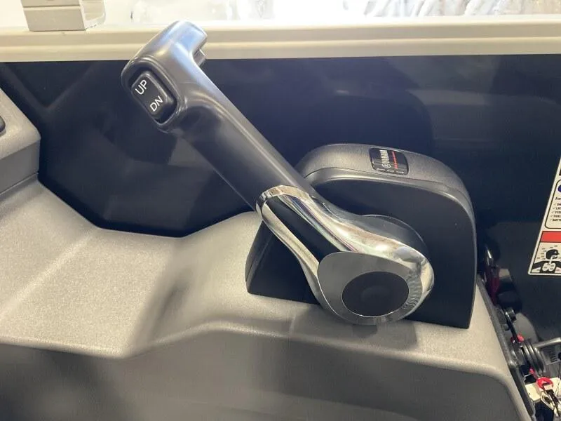 Slide: The Image of Throttle control lever in a 2025 Bennington 188 SF Family boat. - 4