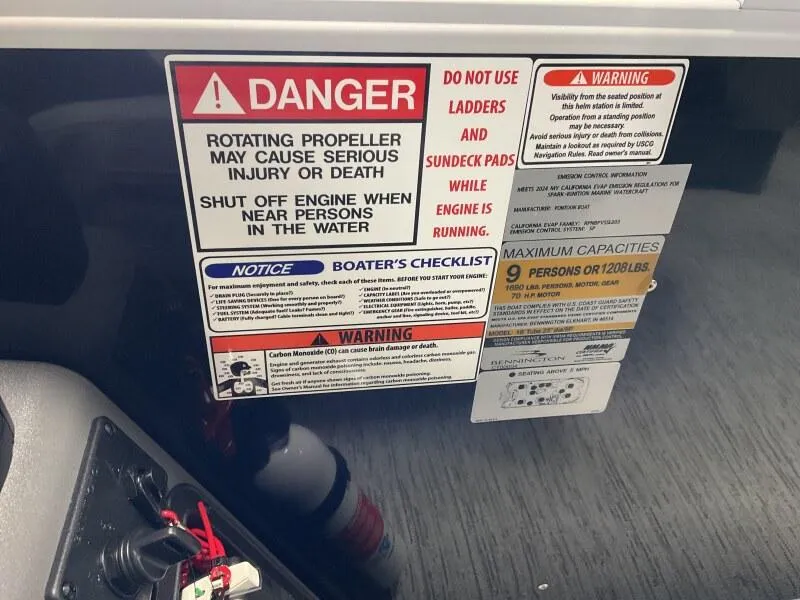Slide: The Image of Warning labels on a 2025 Bennington 188 SF Family boat, highlighting safety precautions. - 5