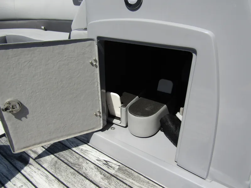 Slide: The Image of Open storage compartment on 2024 Veranda RELAX VR25RFL boat, showcasing interior space. - 16