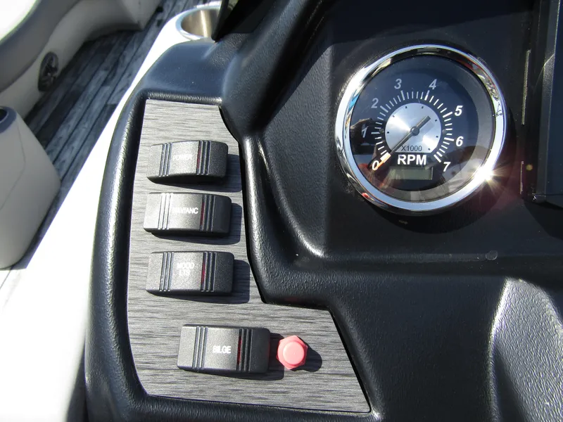 Slide: The Image of 2024 Veranda RELAX VR25RFL dashboard with RPM gauge and control switches. - 20