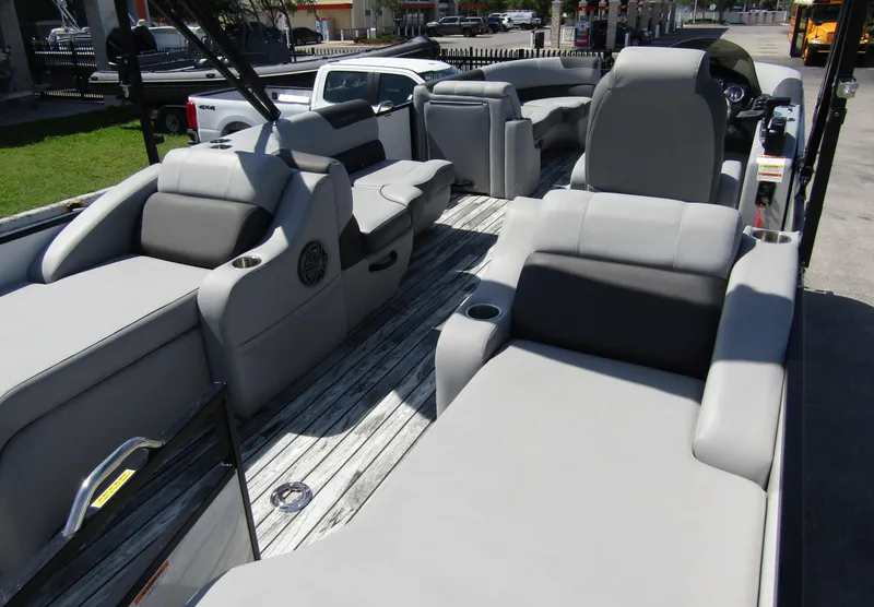 Slide: The Image of 2024 Veranda RELAX VR25RFL pontoon boat with luxurious seating and modern design. - 32