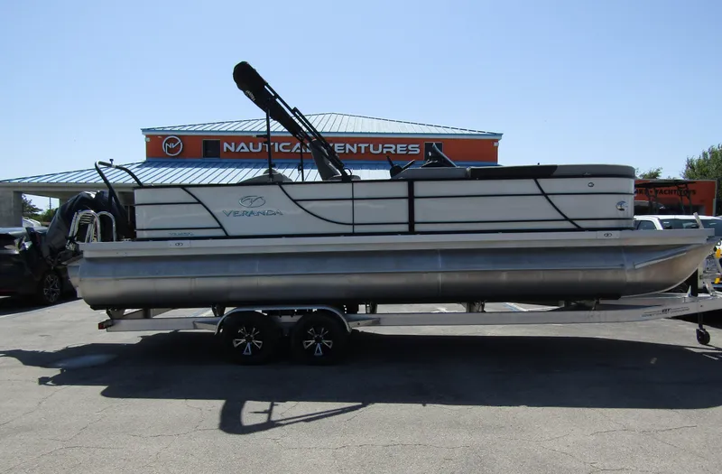 Slide: The Image of 2024 Veranda RELAX VR25RFL pontoon boat on trailer at Nautical Ventures. - 4
