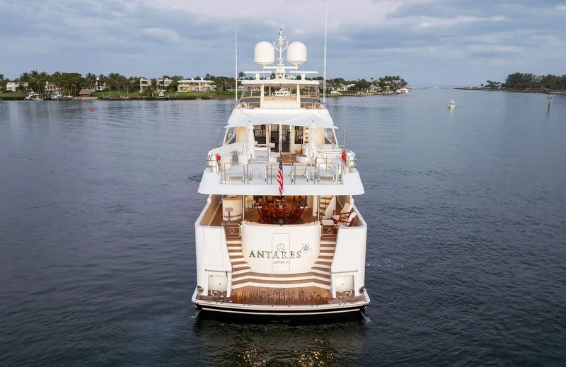 Slide: The Image of Luxury 2008 Westport 130 yacht cruising on calm waters. - 13