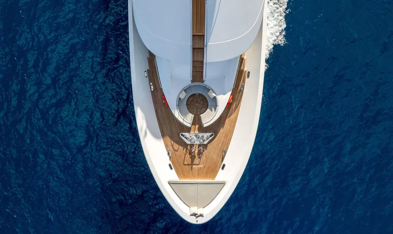 Slide: The Image of Aerial view of 2008 Westport 130 yacht cruising on blue ocean. - 2