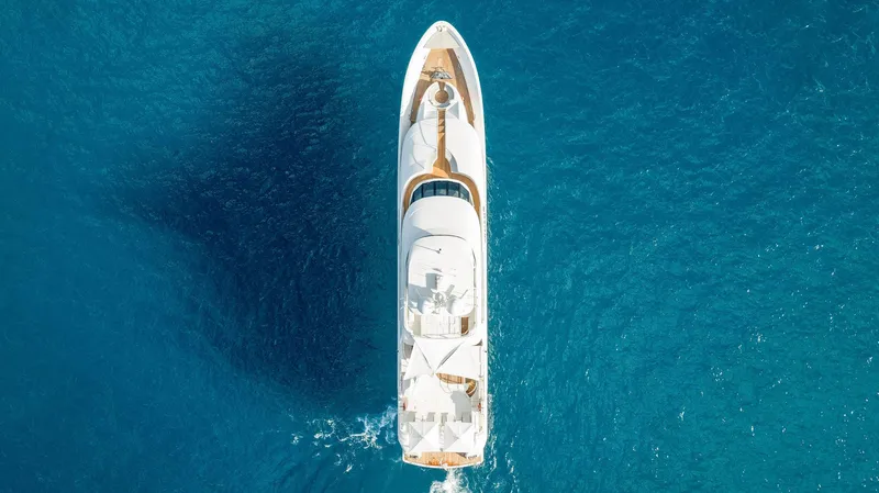 Slide: The Image of Aerial view of 2008 Westport 130 yacht cruising in blue ocean. - 3
