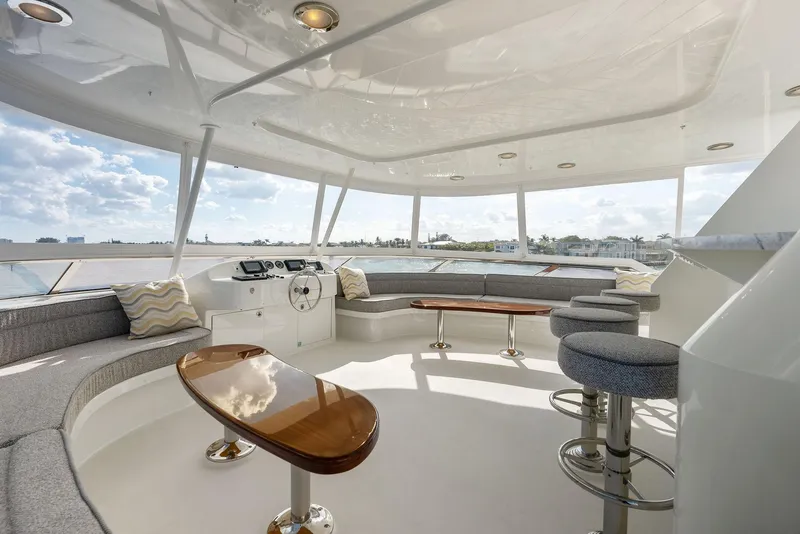 Slide: The Image of Luxurious interior of 2008 Westport 130 yacht with modern seating and panoramic views. - 30
