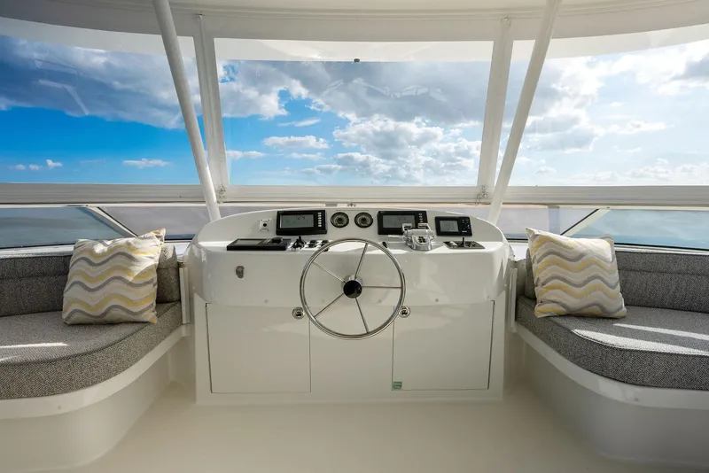 Slide: The Image of Helm station of 2008 Westport 130 yacht with panoramic ocean view. - 31