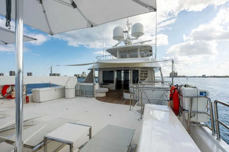Slide: The Image of Luxurious deck of 2008 Westport 130 yacht with seating and ocean view. - 34