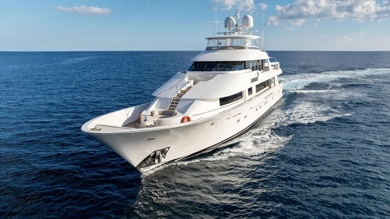 Slide: The Image of Luxurious 2008 Westport 130 yacht cruising on open sea. - 4