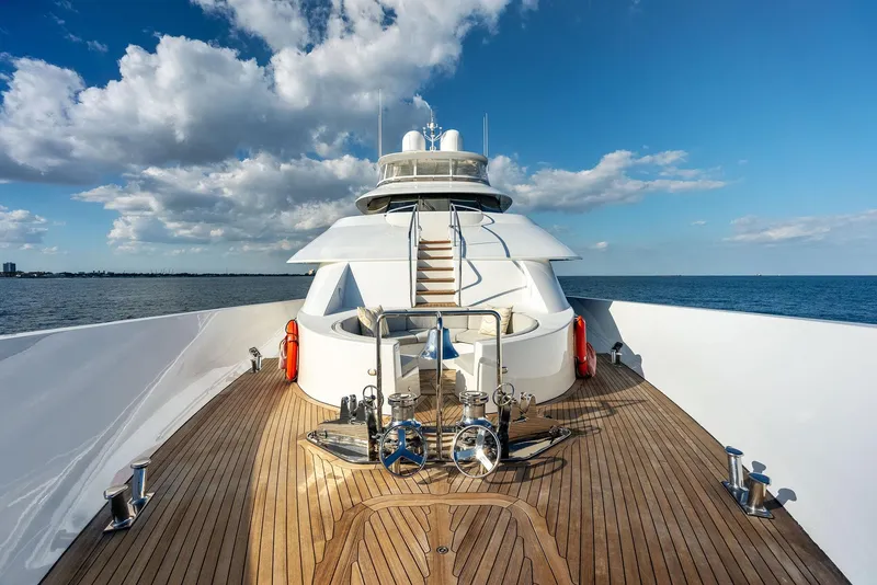Slide: The Image of Luxury yacht Westport 130, 2008 model, with wooden deck and ocean view. - 42
