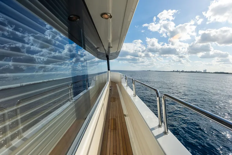 Slide: The Image of Side deck view of 2008 Westport 130 yacht cruising on the ocean. - 44