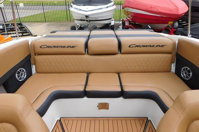 Slide: The Image of 2024 Crownline 220 SS LPX trailer detail with diamond plate and side marker light. - 5