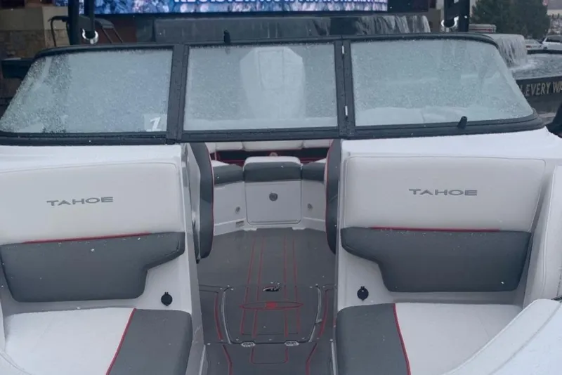 Slide: The Image of 2023 Tahoe 210S boat interior with white and gray seating. - 3