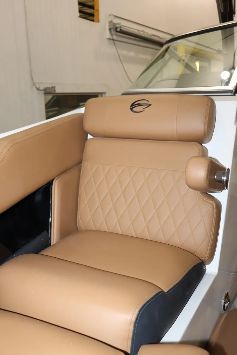 Slide: The Image of 2024 Crownline 240 SS SURF boat with luxurious tan leather seating. - 16