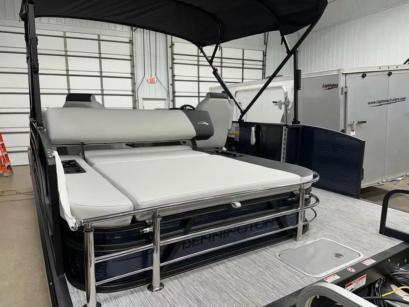 Slide: The Image of 2025 Bennington 22 SSB Tritoon with Yamaha F-150Hp, featuring swing back seating. - 12