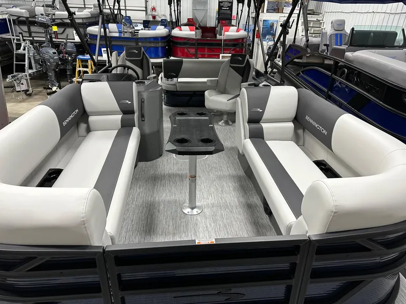 Slide: The Image of 2025 Bennington 22 SSB Tritoon interior with Yamaha F-150Hp, featuring spacious seating and modern design. - 14