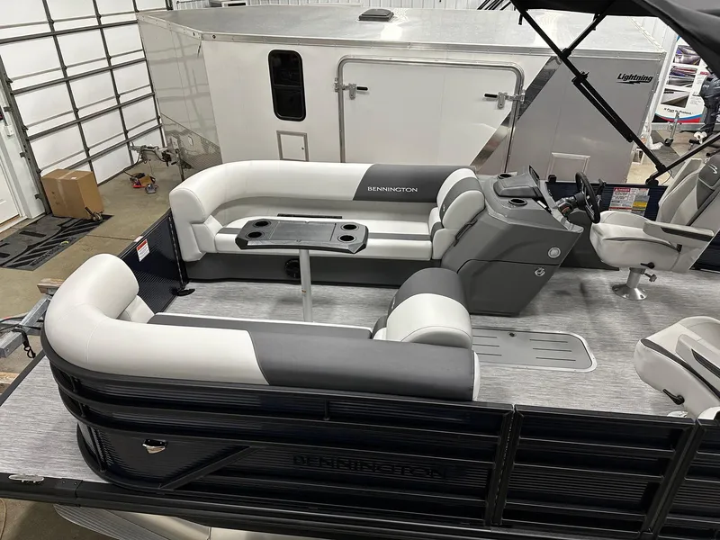 Slide: The Image of 2025 Bennington 22 SSB Tritoon interior with seating and helm, in stock. - 20