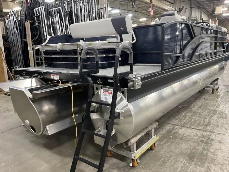 Slide: The Image of 2025 Bennington 22 SSB Swing Back Tritoon with Yamaha F-150Hp in stock, rear view. - 21