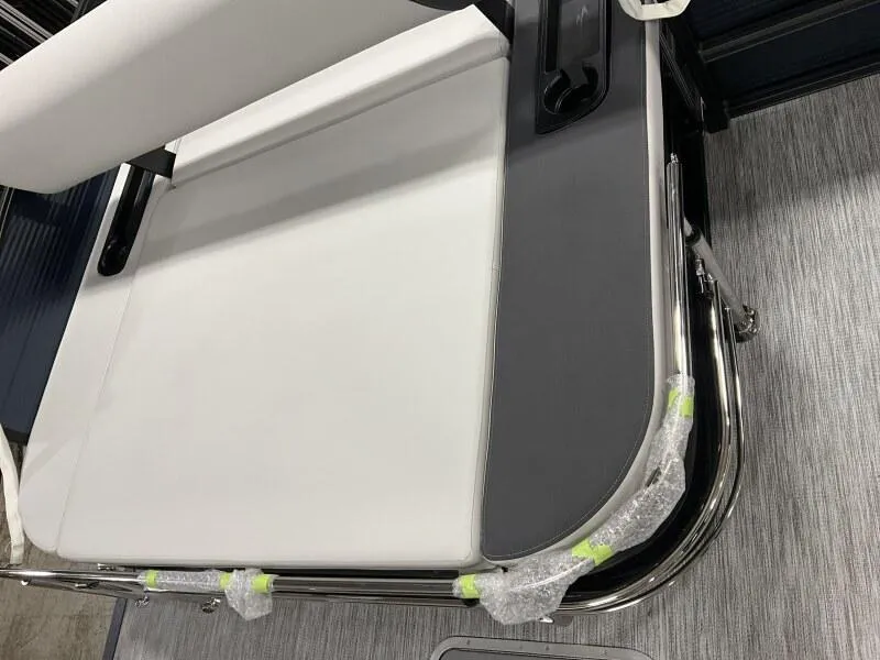 Slide: The Image of 2025 Bennington 22 SSB Tritoon seat detail with sleek design and modern upholstery. - 24