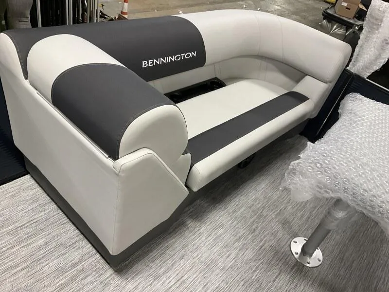 Slide: The Image of Bennington 22 SSB Tritoon seating, 2025 model, featuring sleek gray and white upholstery. - 28