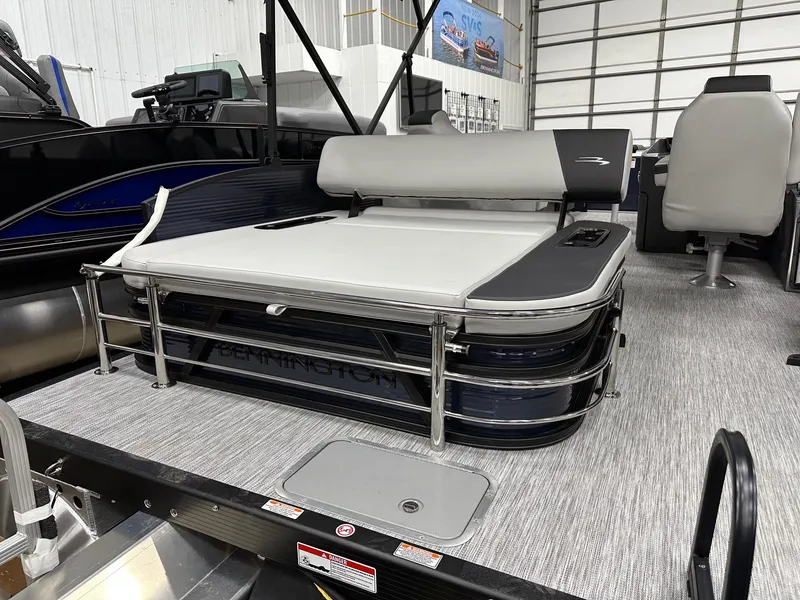 Slide: The Image of 2025 Bennington 22 SSB Tritoon with Yamaha F-150Hp, featuring swing back seating. - 31