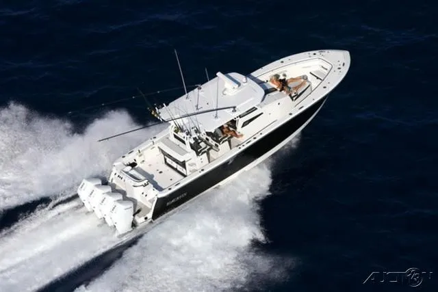 Slide: The Image of 2024 Blackfin 400CC boat cruising on the ocean. - 15