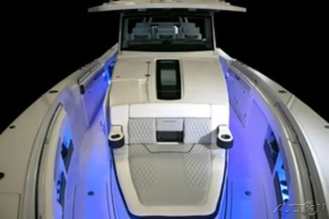 Slide: The Image of 2024 Blackfin 400CC boat with illuminated deck and modern design. - 22