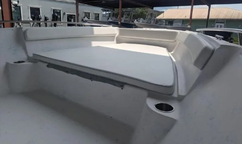 Slide: The Image of 2024 ALK2 Powerboats 22 CRX interior with spacious seating and cup holders. - 3