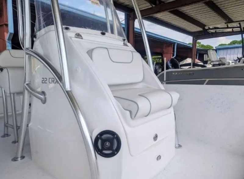 Slide: The Image of 2024 ALK2 Powerboats 22 CRX center console with cushioned seating. - 4