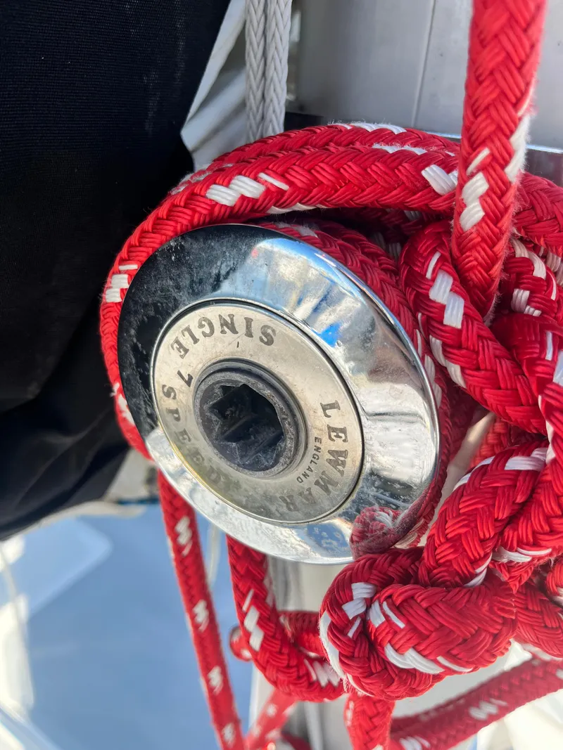 Slide: The Image of Close-up of a Lewmar winch with red ropes on a 1985 Cape Dory 270 sailboat. - 18