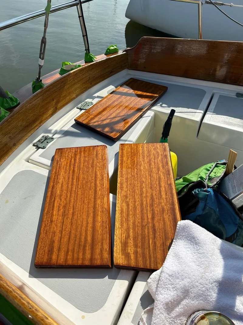 Slide: The Image of Polished wooden panels on a 1985 Cape Dory 270 sailboat deck. - 26
