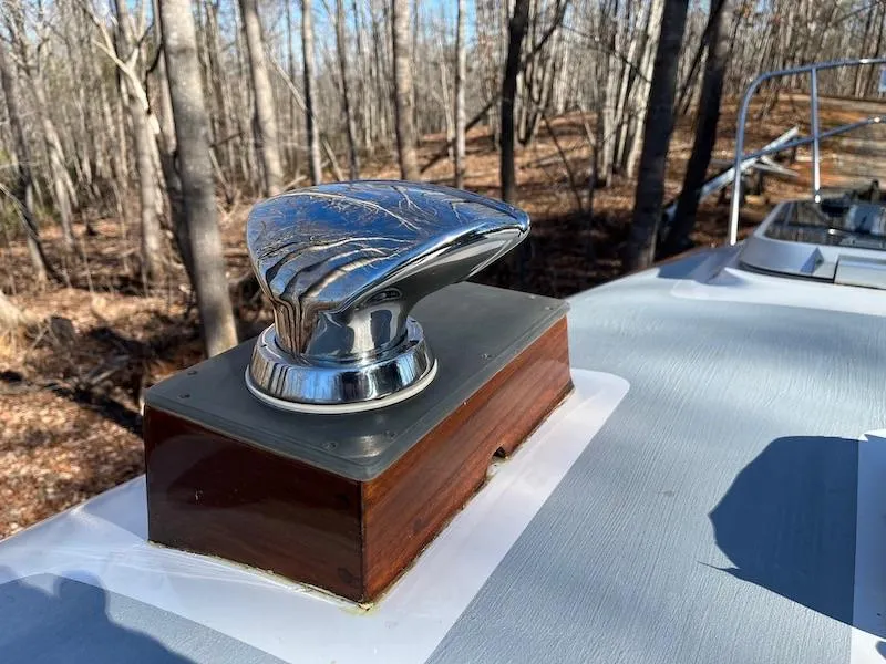 Slide: The Image of Close-up of a 1985 Cape Dory 270 boat's deck hardware in a wooded area. - 28