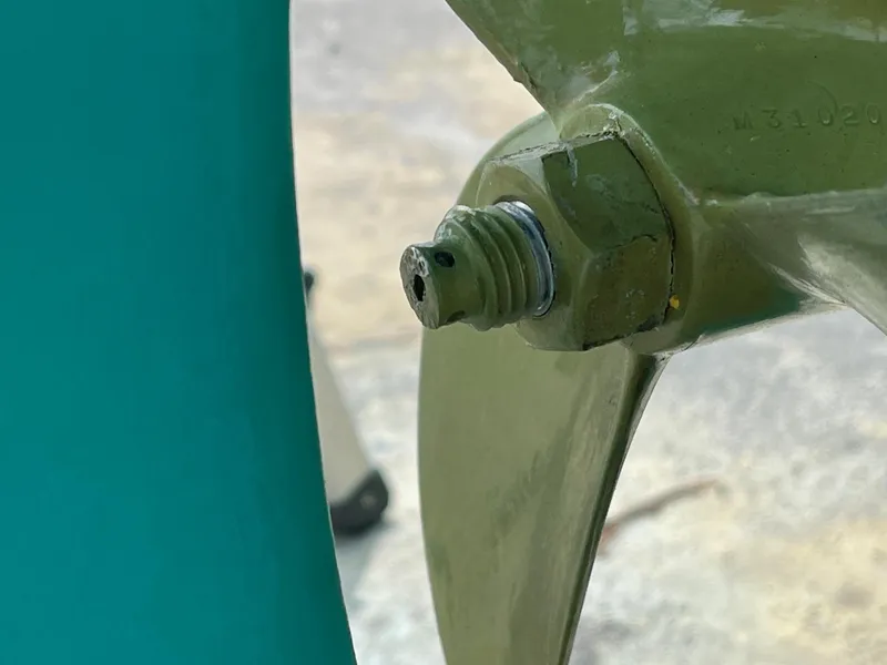 Slide: The Image of Close-up of a 1985 Cape Dory 270 propeller and nut assembly. - 32
