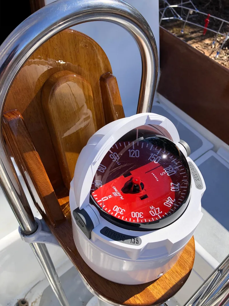 Slide: The Image of Compass on 1985 Cape Dory 270 sailboat helm. - 41