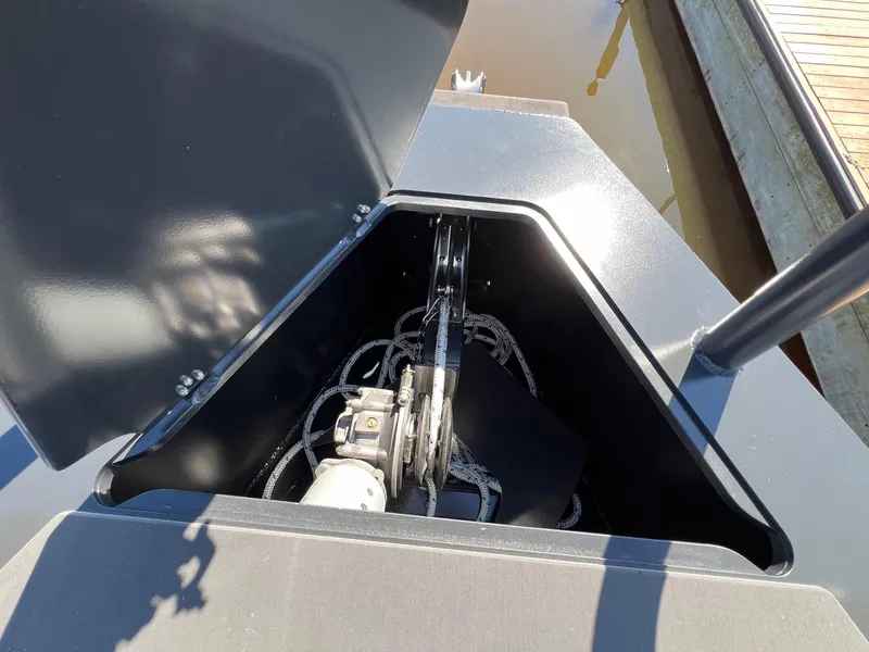 Slide: The Image of Anchor compartment of 2024 G-Force G-Force 10 boat with ropes and winch. - 11