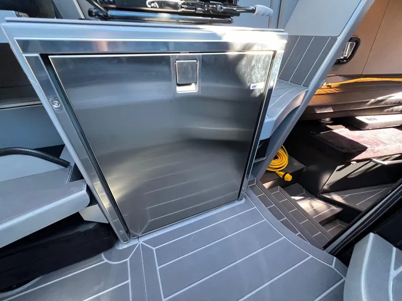 Slide: The Image of G-Force 10 2024 model interior, featuring a sleek stainless steel refrigerator. - 17