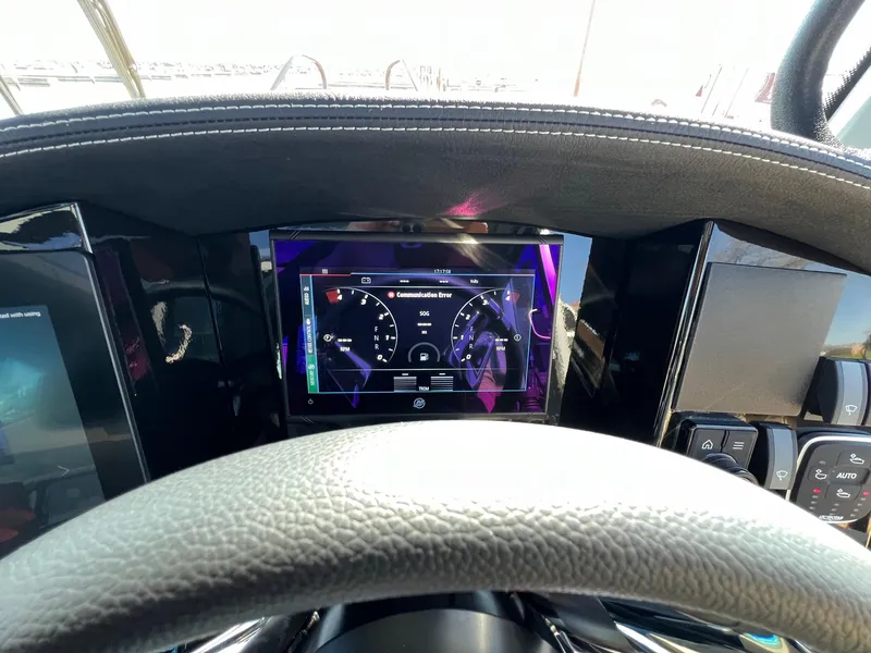 Slide: The Image of 2024 G-Force 10 dashboard with digital display and steering wheel. - 25