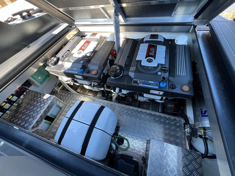 Slide: The Image of 2024 G-Force 10 boat engine compartment with dual engines and advanced components. - 30