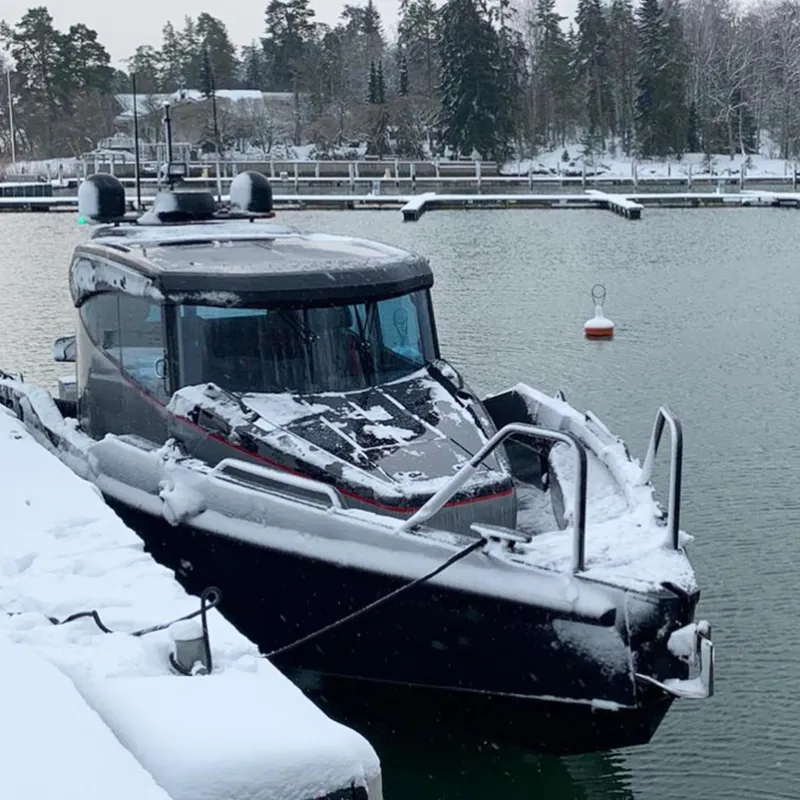 Slide: The Image of 2024 G-Force 10 boat docked in a snowy marina. - 36