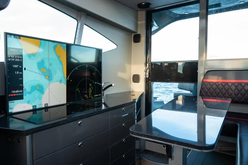 Slide: The Image of Modern navigation system inside 2024 G-Force 10 boat with ocean view. - 44