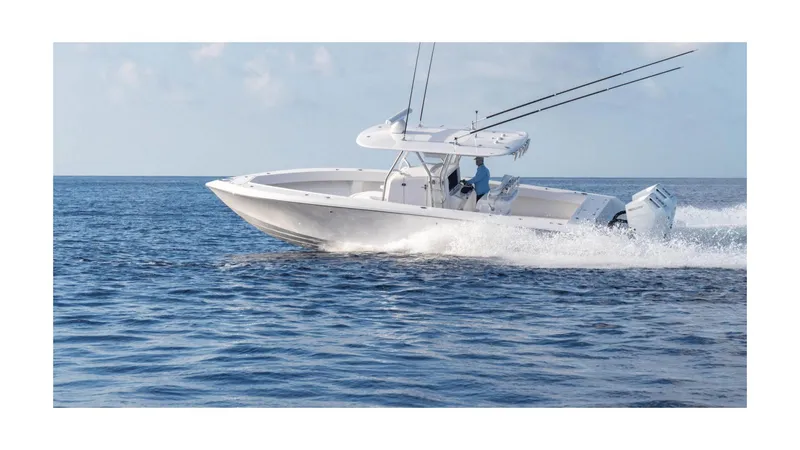 Slide: The Image of 2024 Bahama 35 Super Center Console boat cruising on open water. - 2