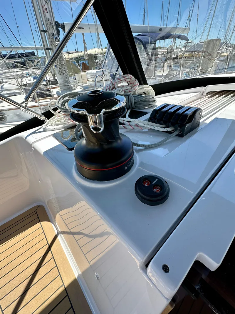 Slide: The Image of 2024 Elan Impression 43 yacht deck with winch and control panel. - 23