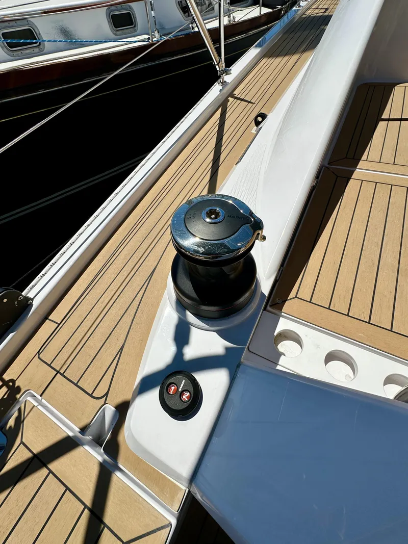 Slide: The Image of 2024 Elan Impression 43 yacht deck with winch and teak flooring. - 26