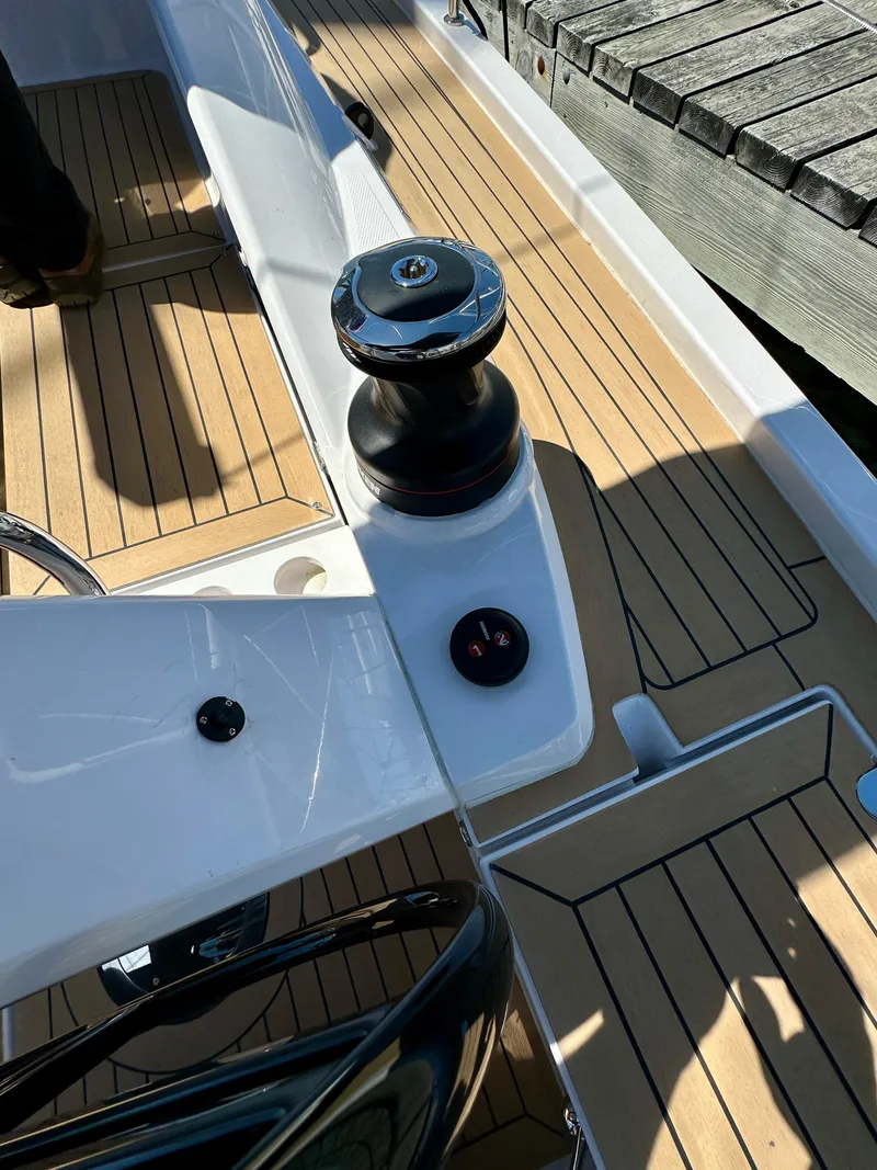 Slide: The Image of 2024 Elan Impression 43 yacht deck with winch and teak flooring. - 28