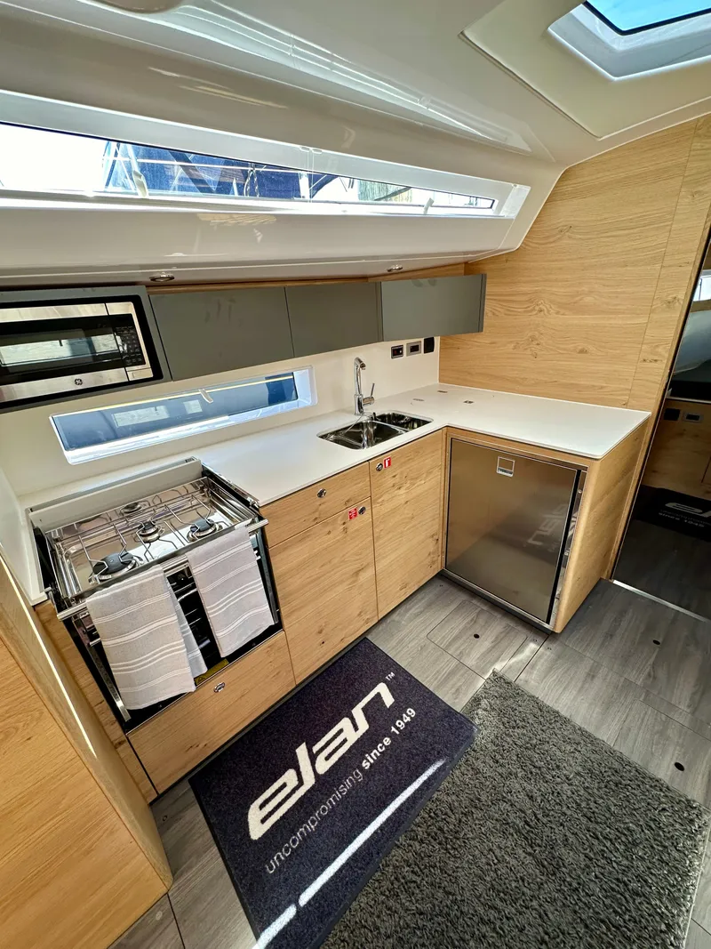 Slide: The Image of Modern kitchen interior of 2024 Elan Impression 43 yacht with sleek design and appliances. - 33