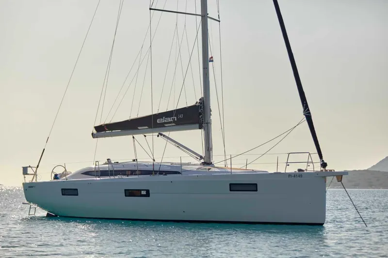 Slide: The Image of 2024 Elan Impression 43 sailboat on calm waters. - 6