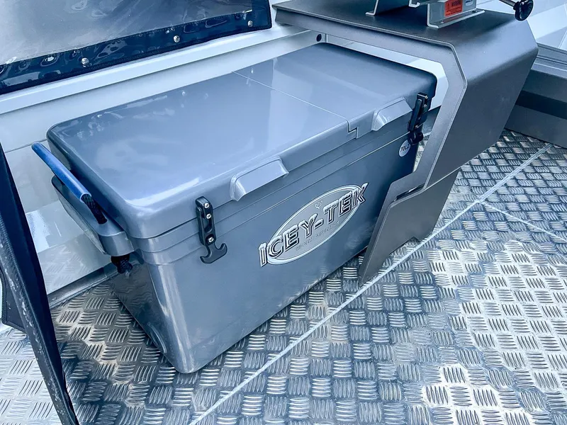 Slide: The Image of Icey-Tek cooler on 2024 Stabicraft 1850 Fisher boat with diamond plate flooring. - 11