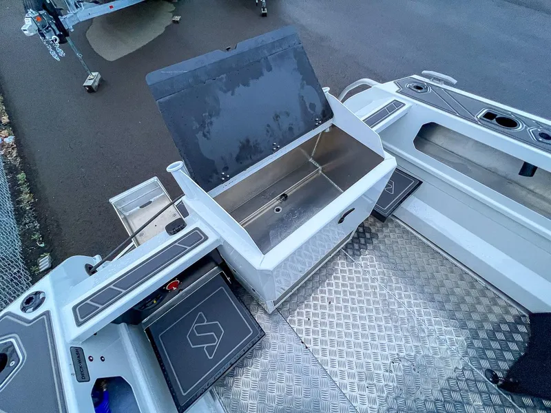 Slide: The Image of 2024 Stabicraft 1850 Fisher boat with open storage compartment and non-slip flooring. - 14